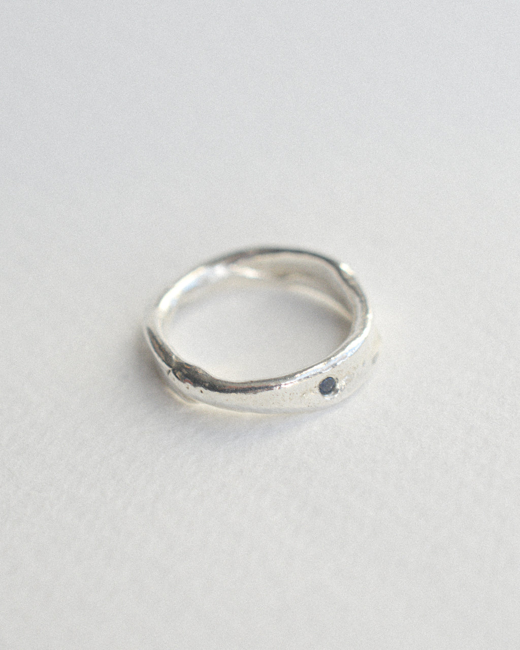 Half molten sapphire ring